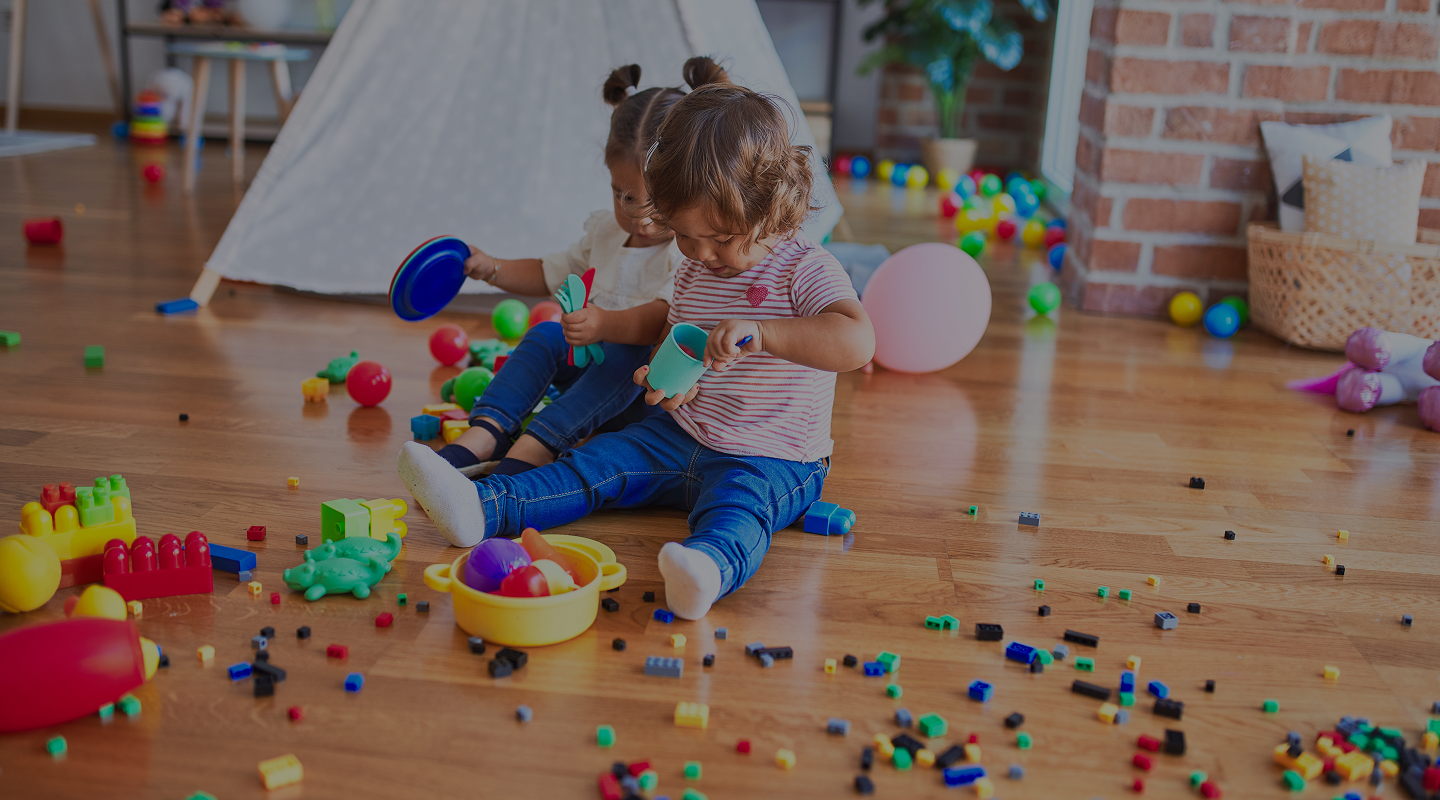 adorable-toddlers-playing-meals-using-plastic-food-cutlery-toy-kindergarten